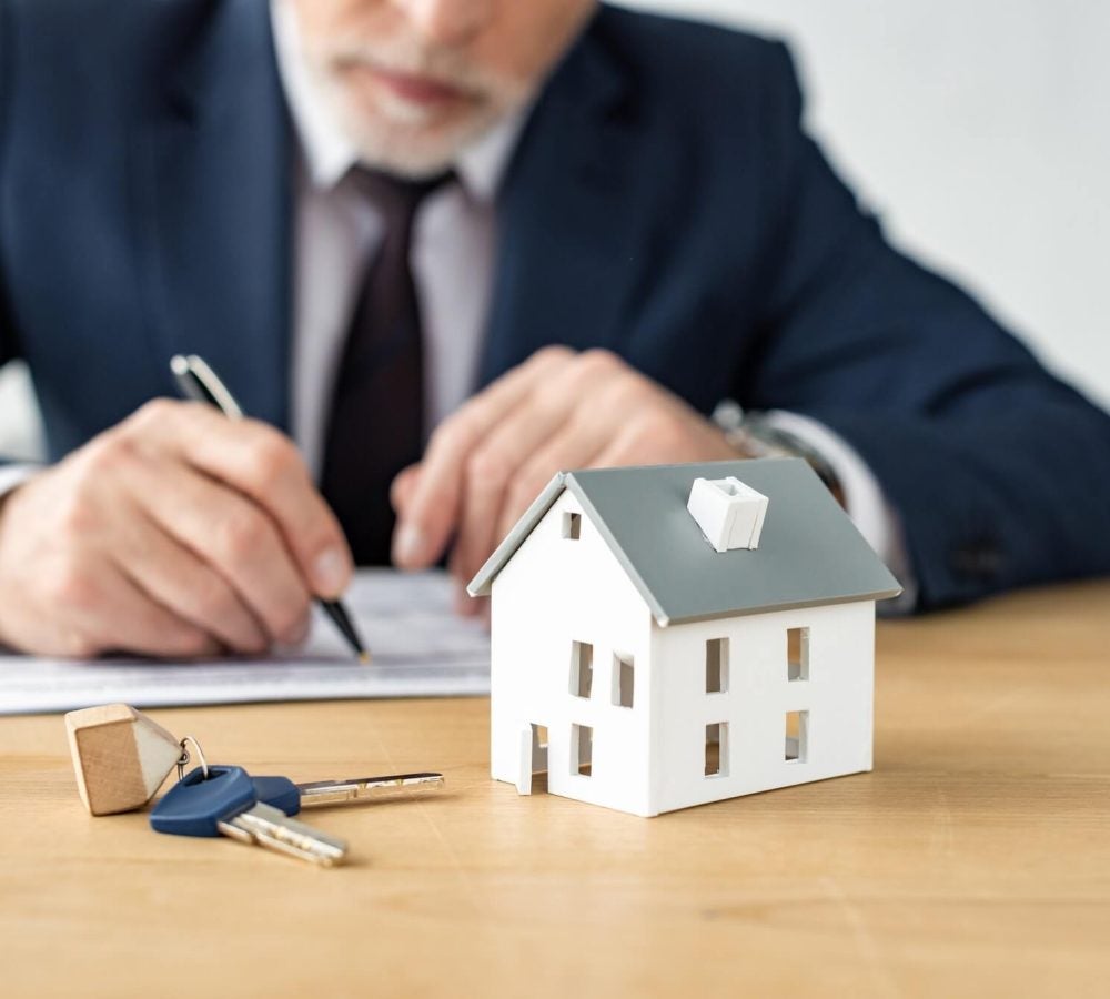 selective-focus-of-house-model-near-keys-and-house-dealer.jpg selective-focus-of-house-model-near-keys-and-house-dealer.jpg